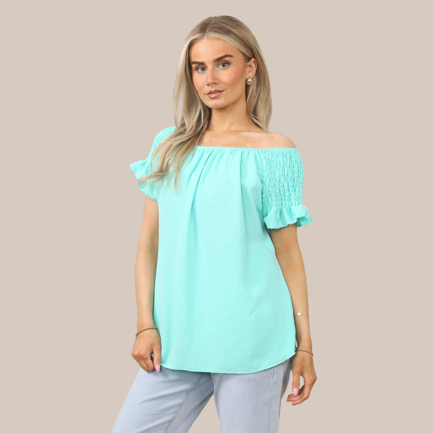 Short sleeve off the shoulder top. Available in various colours