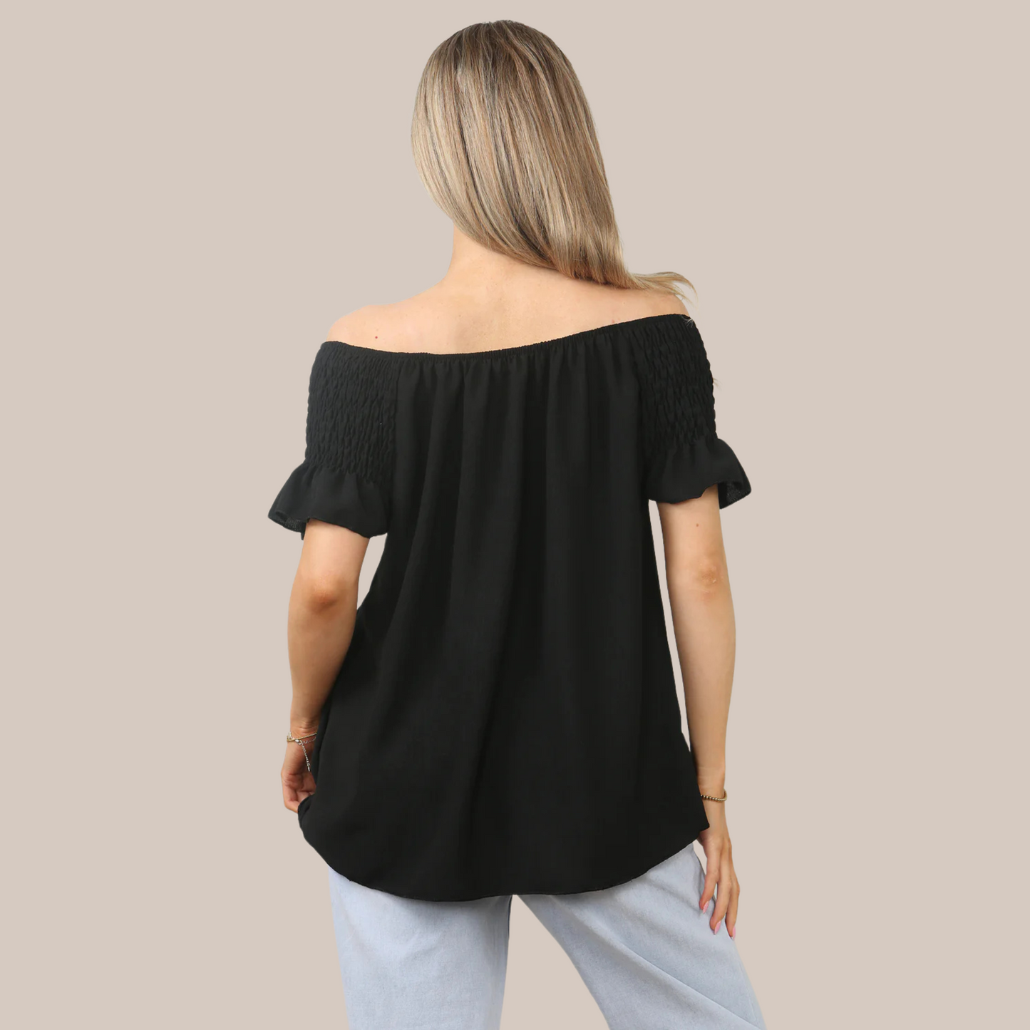 Short sleeve off the shoulder top. Available in various colours