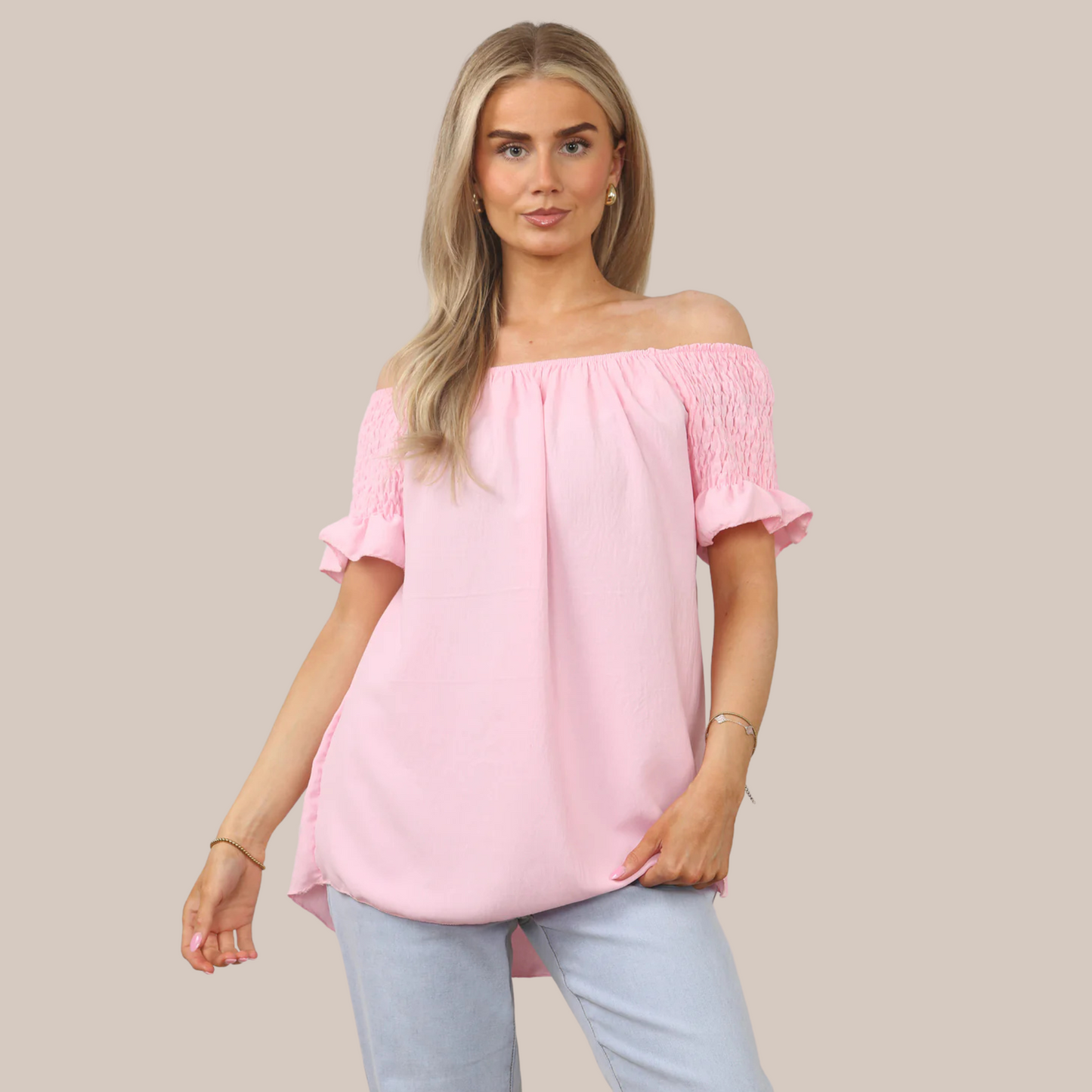 Short sleeve off the shoulder top. Available in various colours
