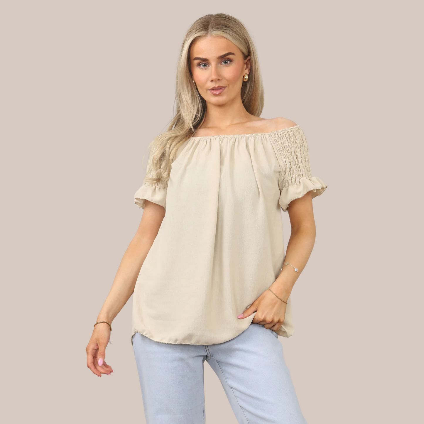 Short sleeve off the shoulder top. Available in various colours