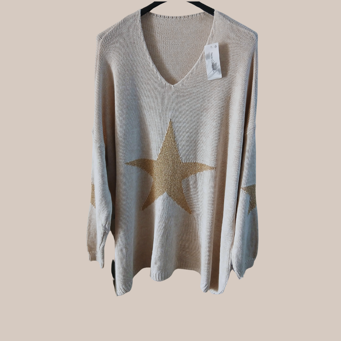 Oversized sparkle star print jumper. Also available in beige