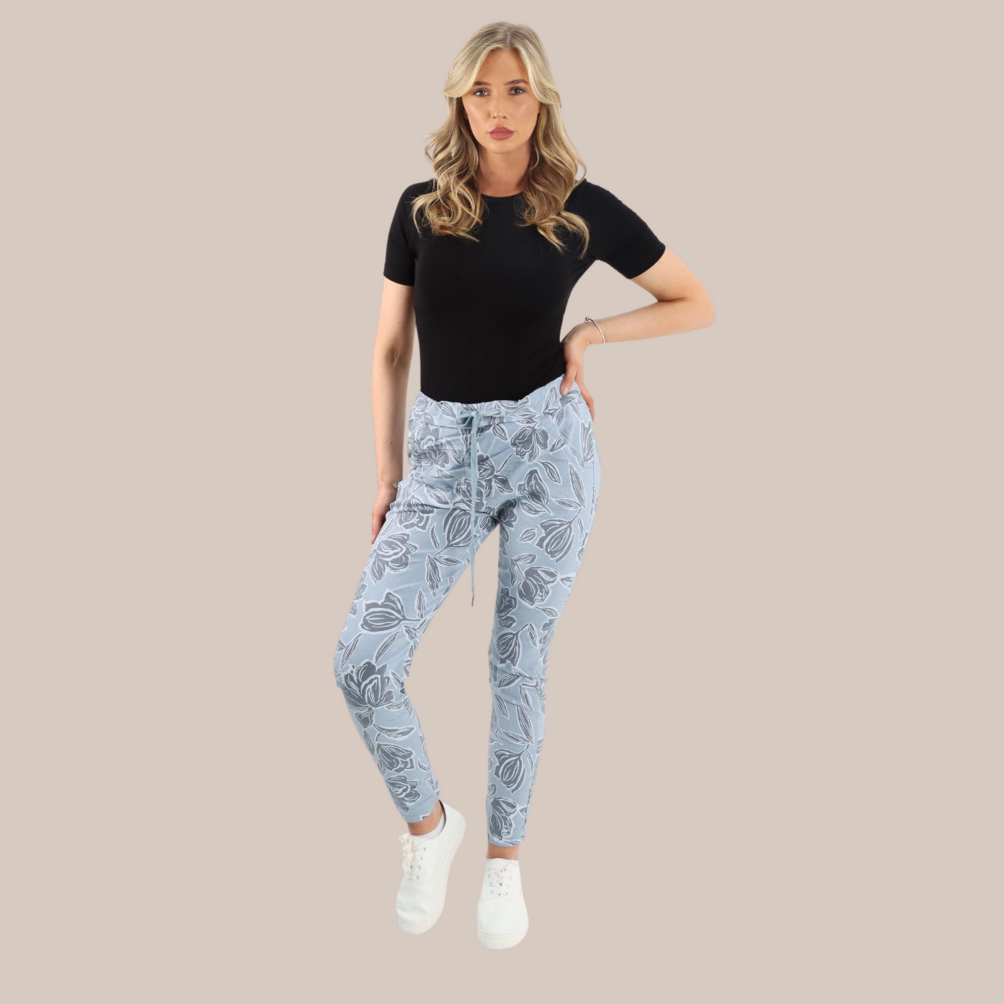 Floral print stretch magic trousers. Also available in blue.