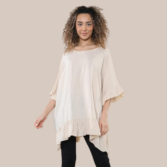 Beige round neck lightweight shirt with frill trim.