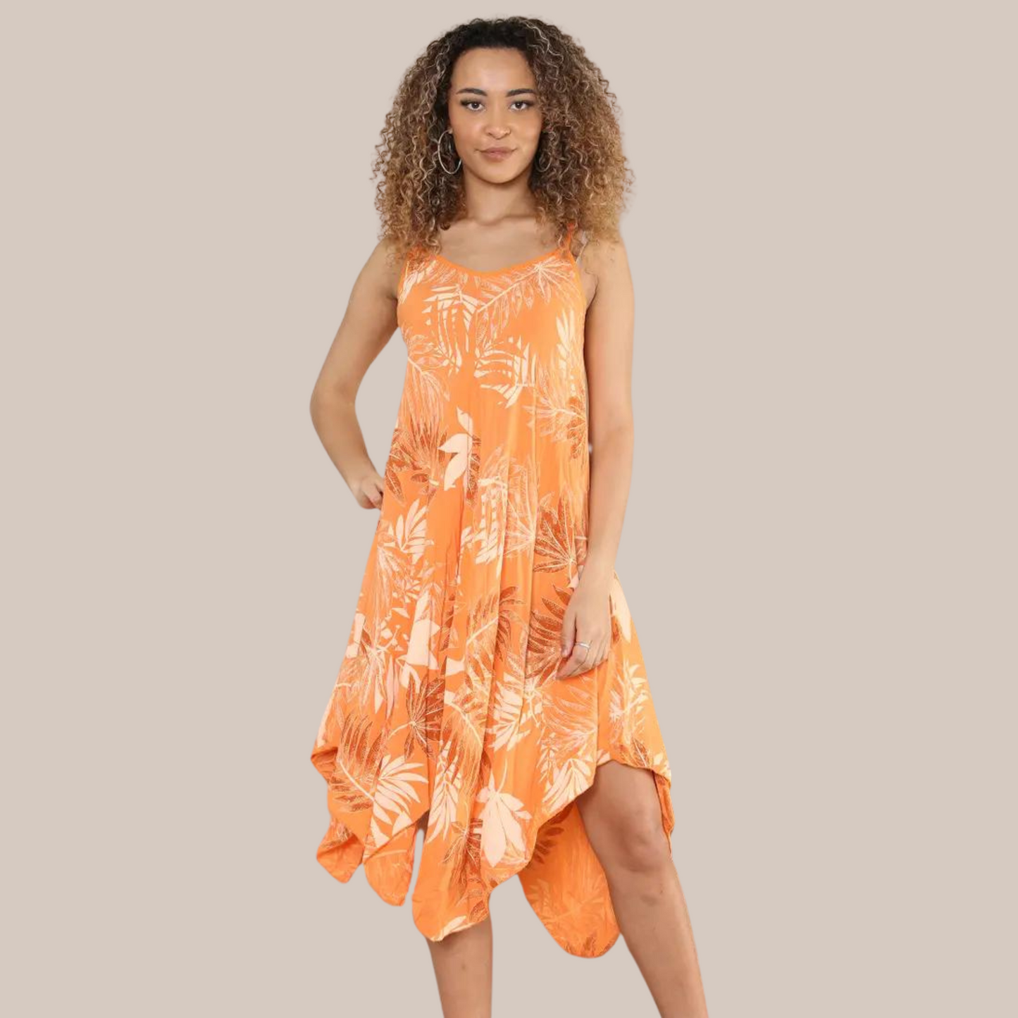 Leaf print handkerchief dress. Available in various colours