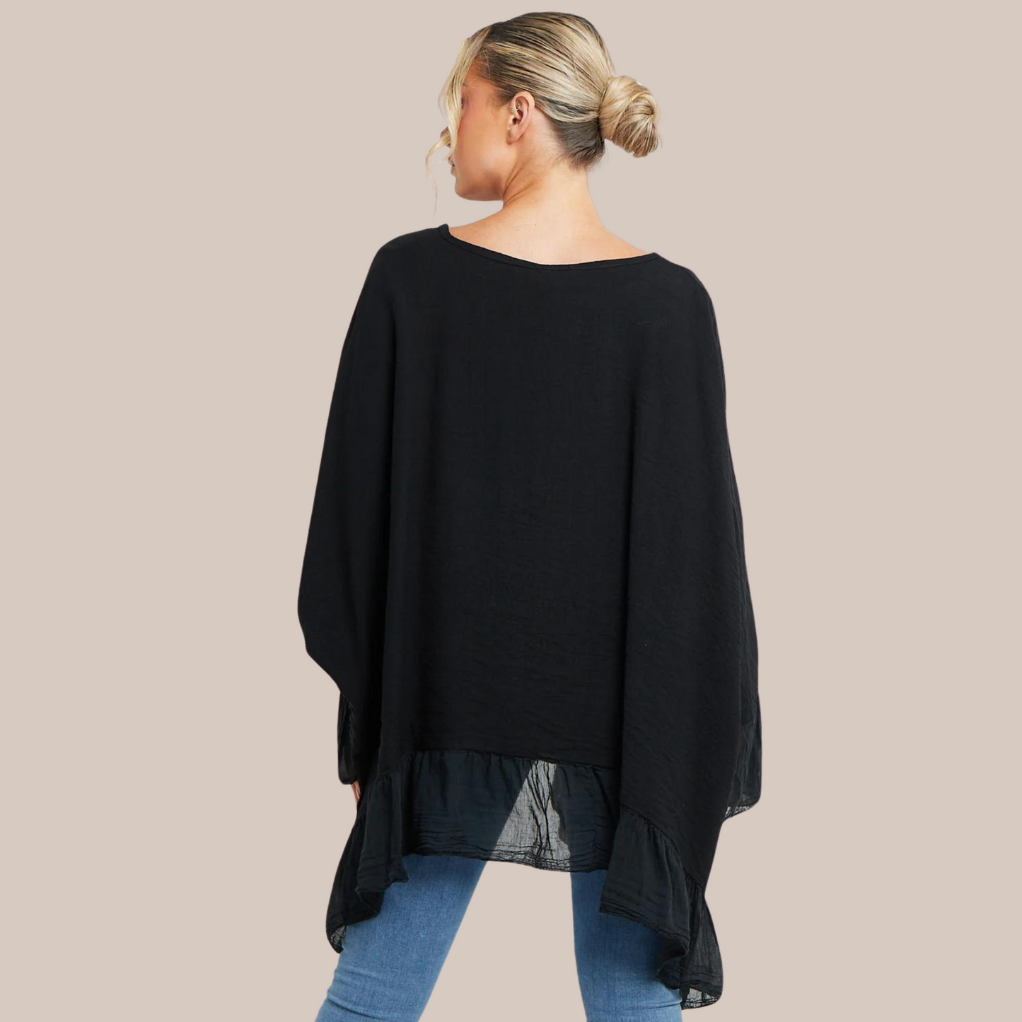 Oversized top.  Also available in black