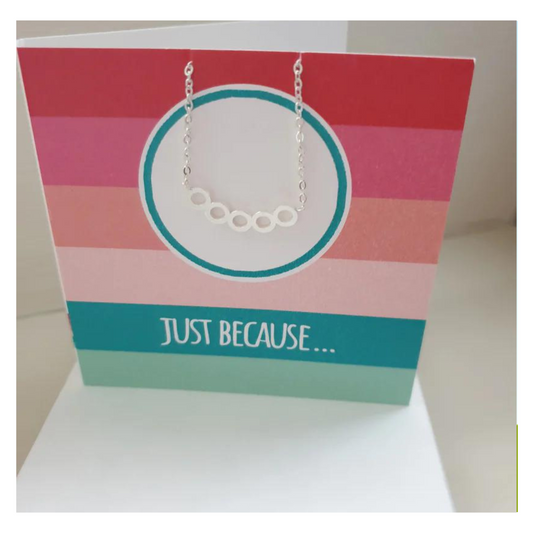 Just because boxed greeting card with circle necklace