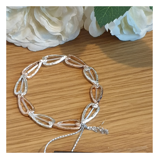 Linked stretch bracelet in silver and rose gold